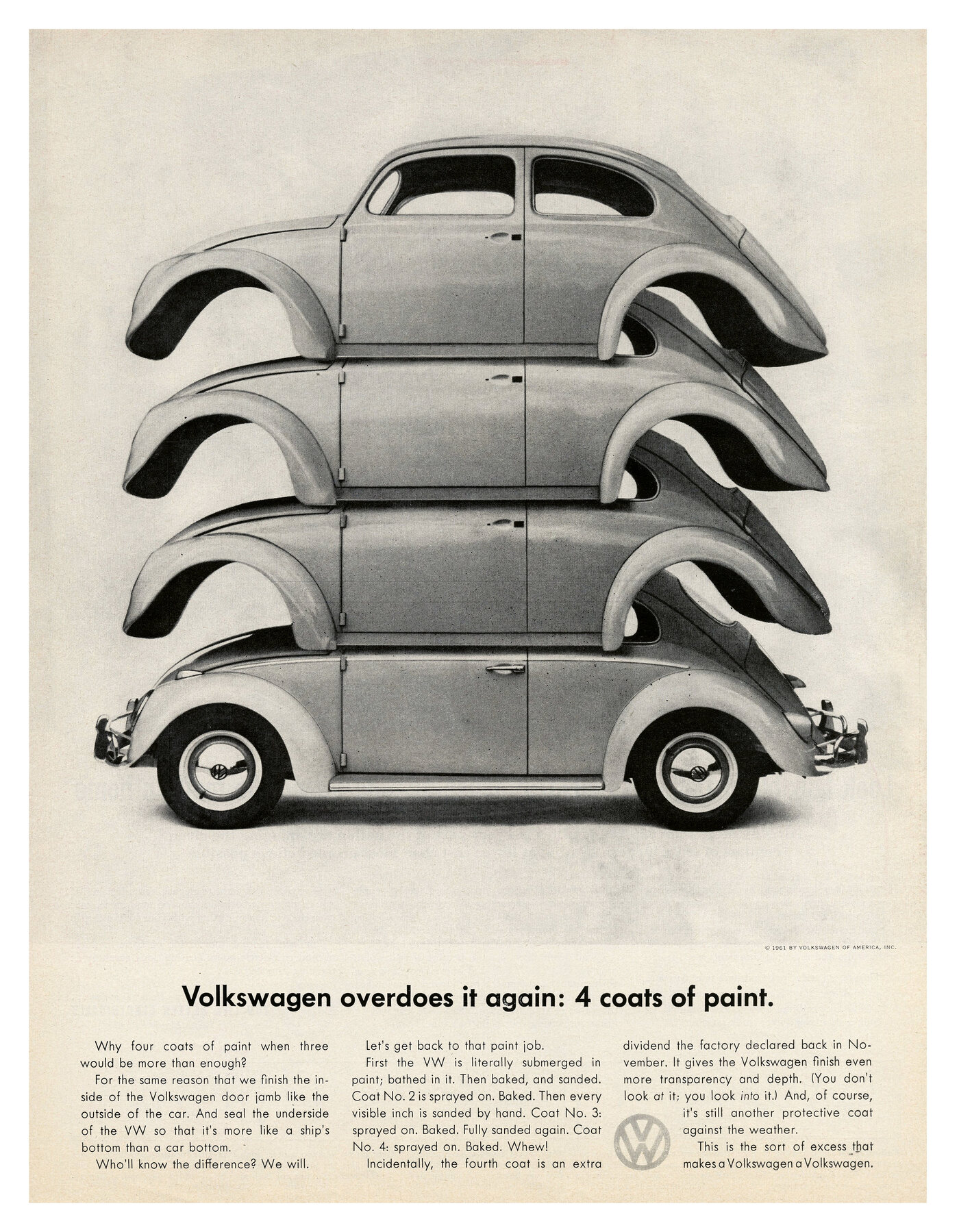 Four VW bugs stacked on top of each other.